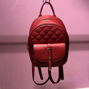 Red quilted faux leather backpack purse